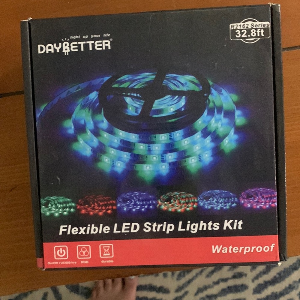 Never been used multicolor LED waterproof strip lights kit with remote control.
